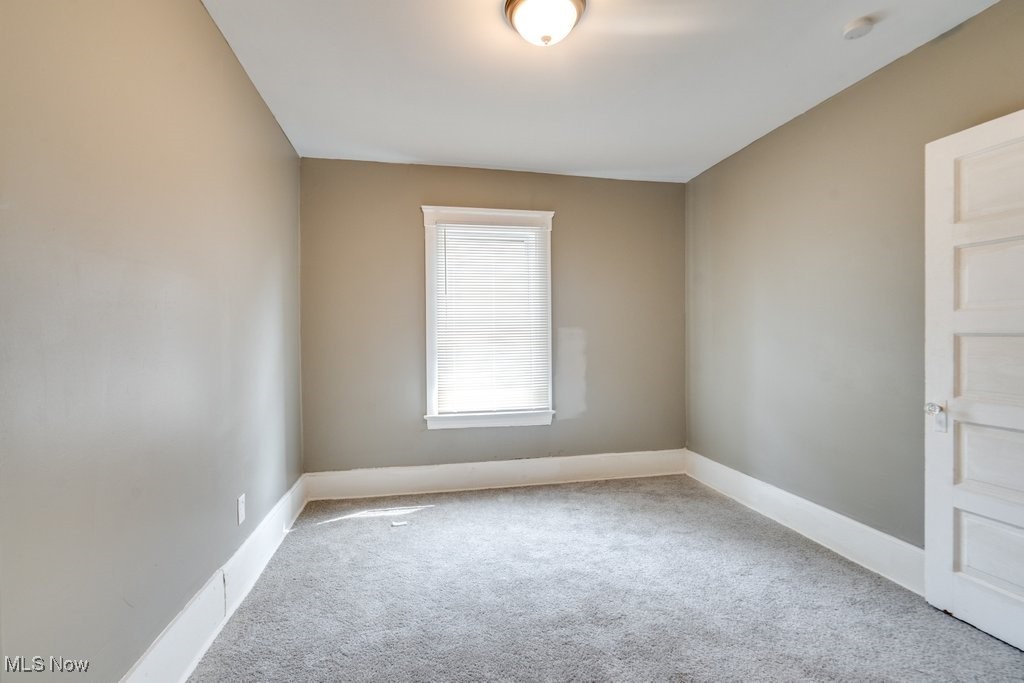 1261 Rozelle Avenue Cleveland, OH 44112 - Photo 19 of 32 Empty room with carpet floors