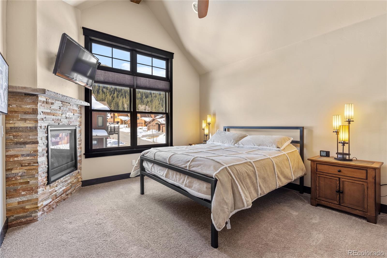 68 Independence Road Keystone, CO 80435 - Photo 15 of 34 a bedroom with a bed dresser and a window