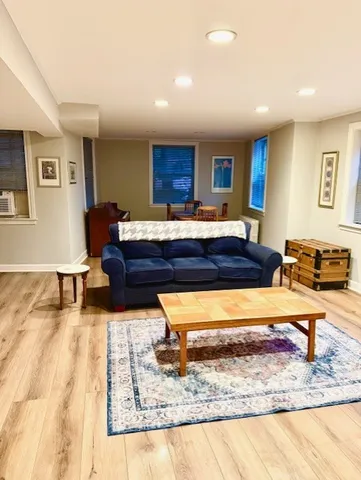 a living room with furniture and a couch
