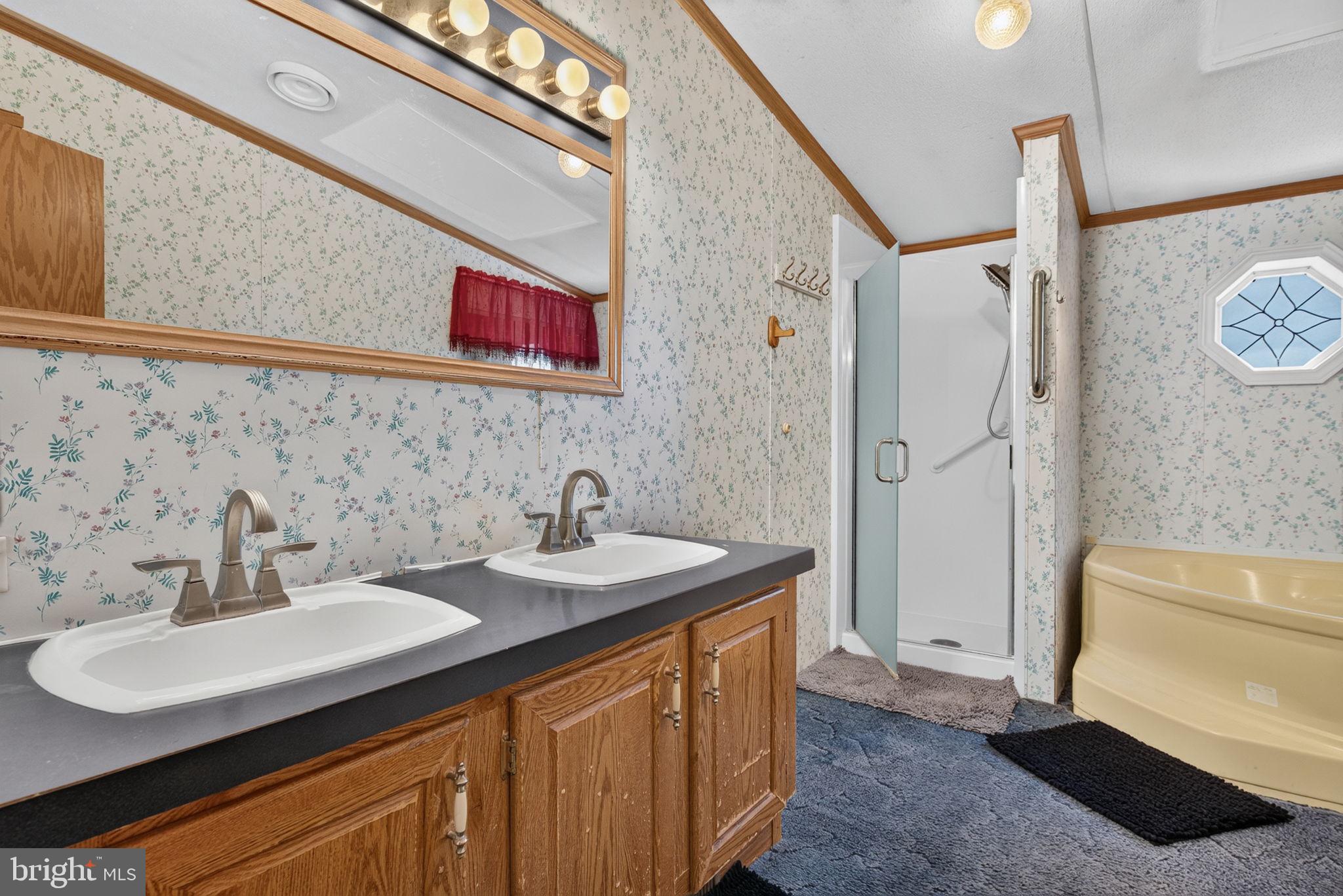 1910 Schubert Road, Unit 8 Bethel, PA 19507 - Photo 20 of 40 Primary bath has dual sinks and a shower