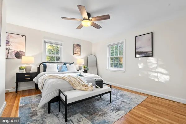 a bed room with a bed and a window