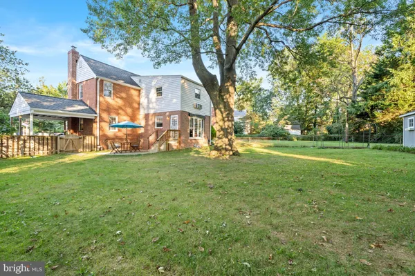 a view of a house with a big yard