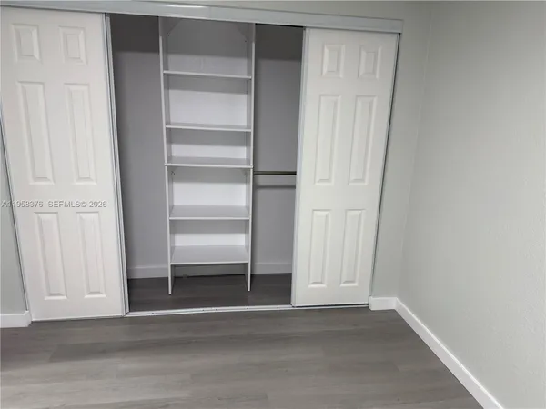 a view of an empty walk in closet