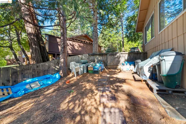 a view of a backyard with a patio