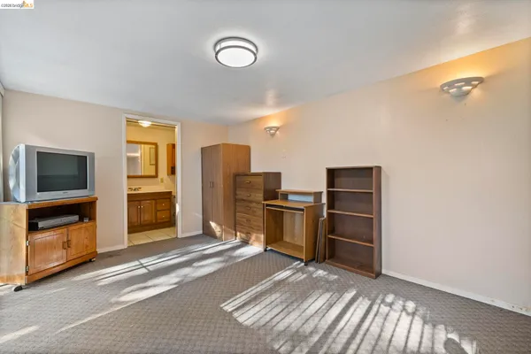 a view of a livingroom with furniture and furniture