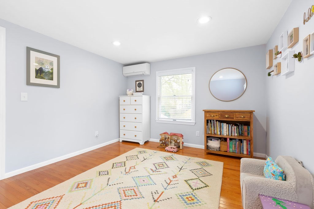 10 Craft Road Natick, MA 01760 - Photo 21 of 32 a bedroom with a bed and a window