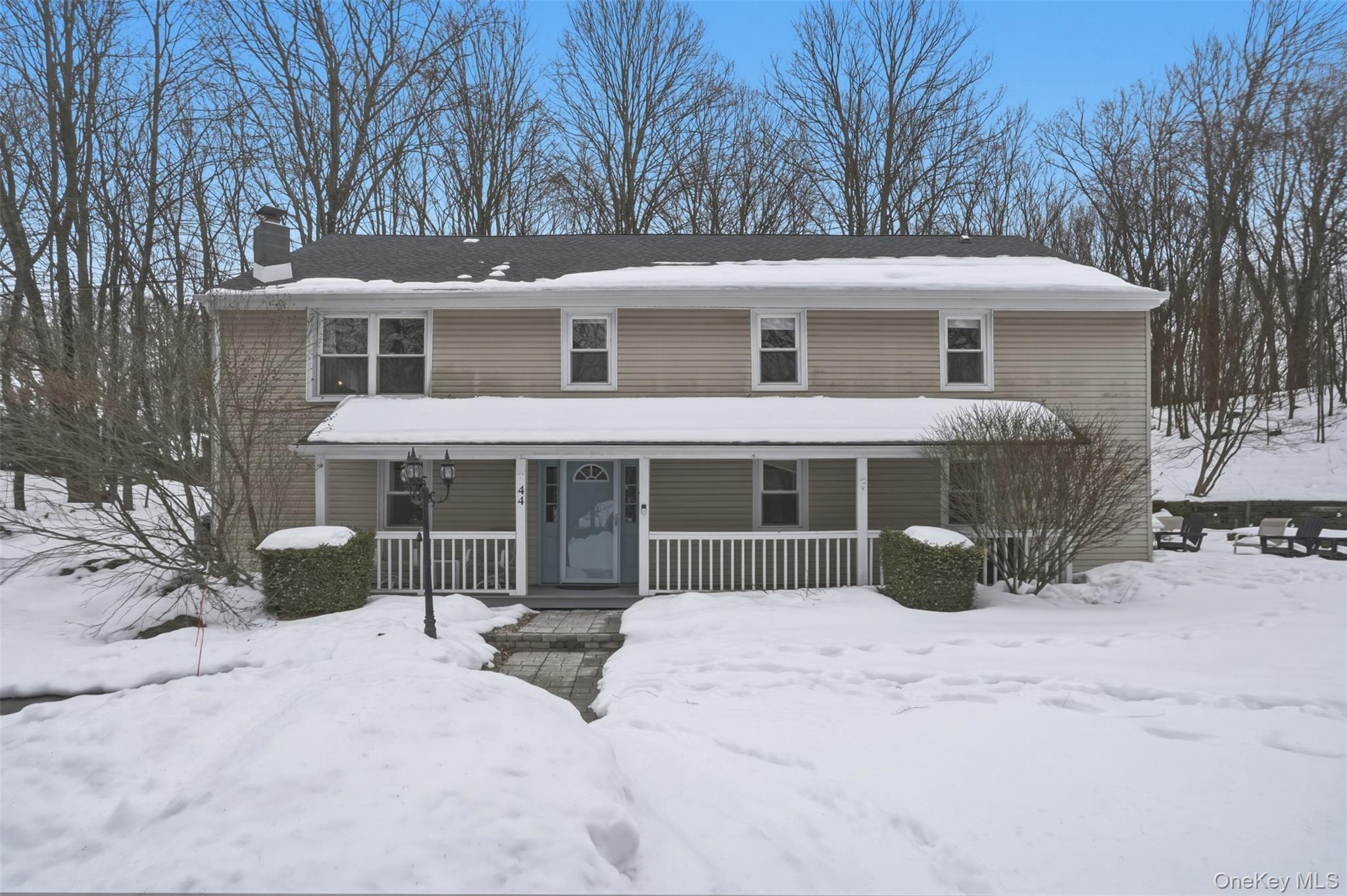 44 Triangle Of Clearwater Road Highland, NY 12528 - Photo 1 of 48 a front view of a house with a yard covered in snow