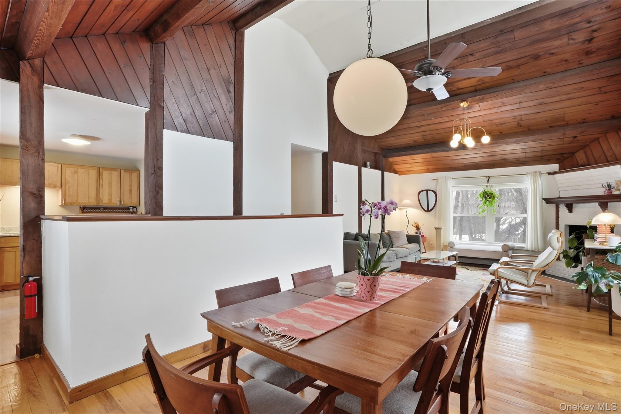 44 Triangle Of Clearwater Road Highland, NY 12528 - Photo 13 of 48 a view of a dining room with furniture and wooden floor