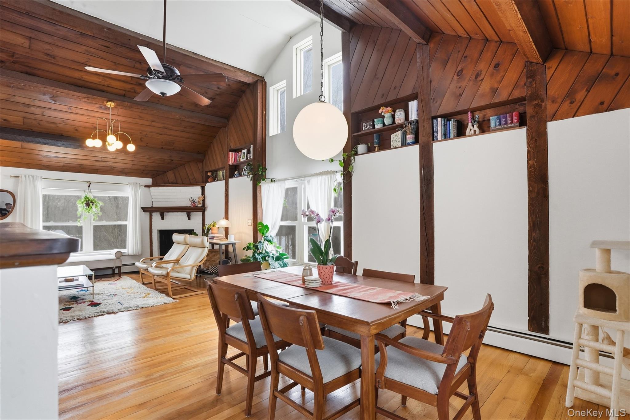 44 Triangle Of Clearwater Road Highland, NY 12528 - Photo 14 of 48 a view of a dining room with furniture and wooden floor