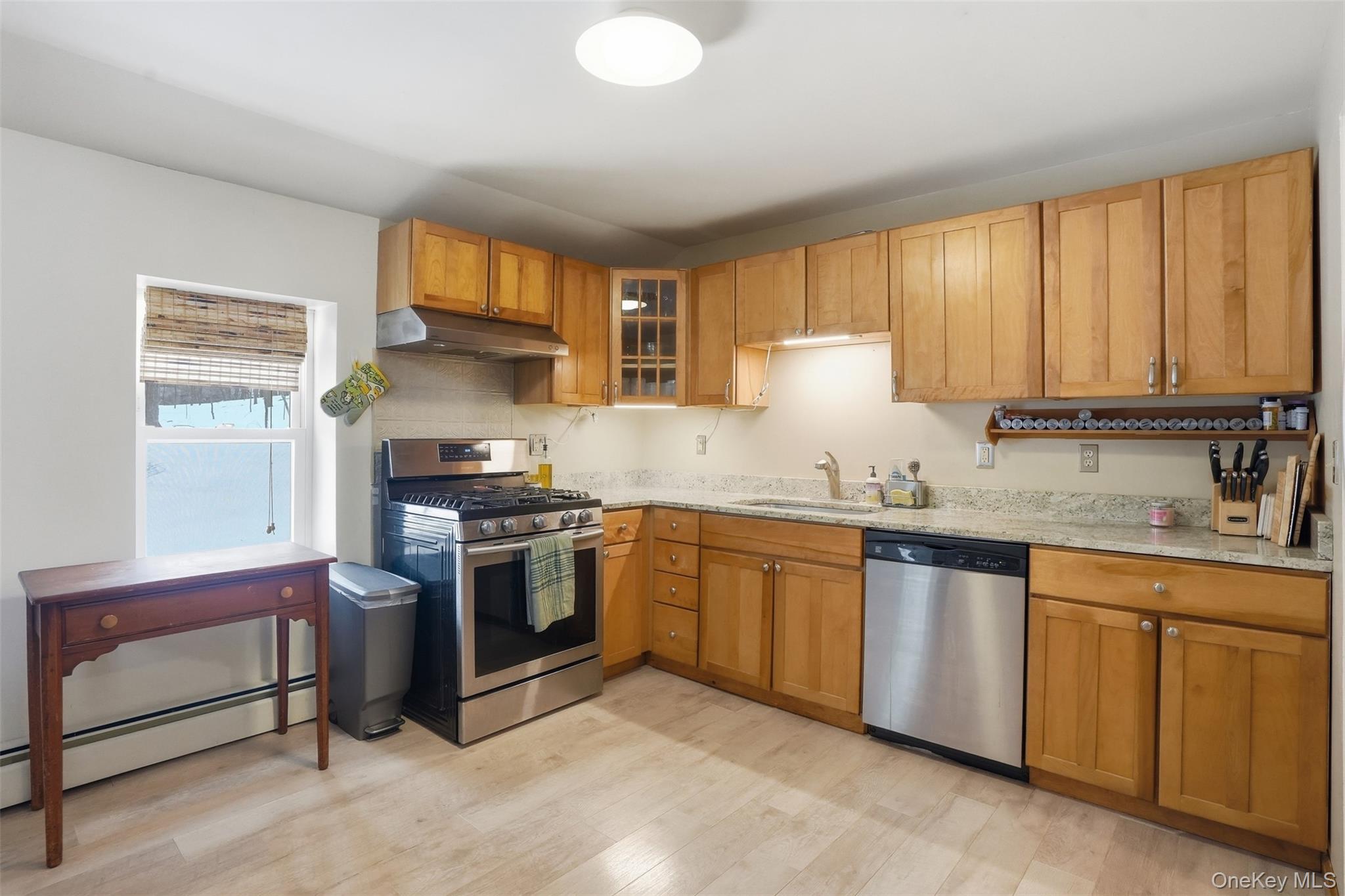 44 Triangle Of Clearwater Road Highland, NY 12528 - Photo 17 of 48 a kitchen with granite countertop a sink stainless steel appliances and cabinets