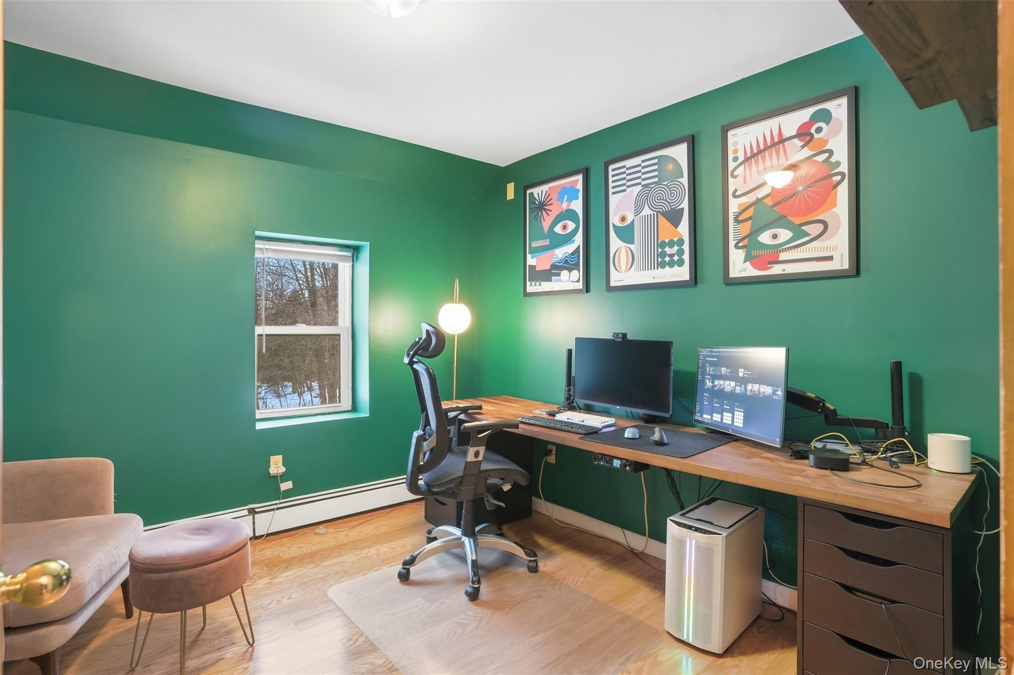 44 Triangle Of Clearwater Road Highland, NY 12528 - Photo 18 of 48 a view of a workspace with furniture and a window