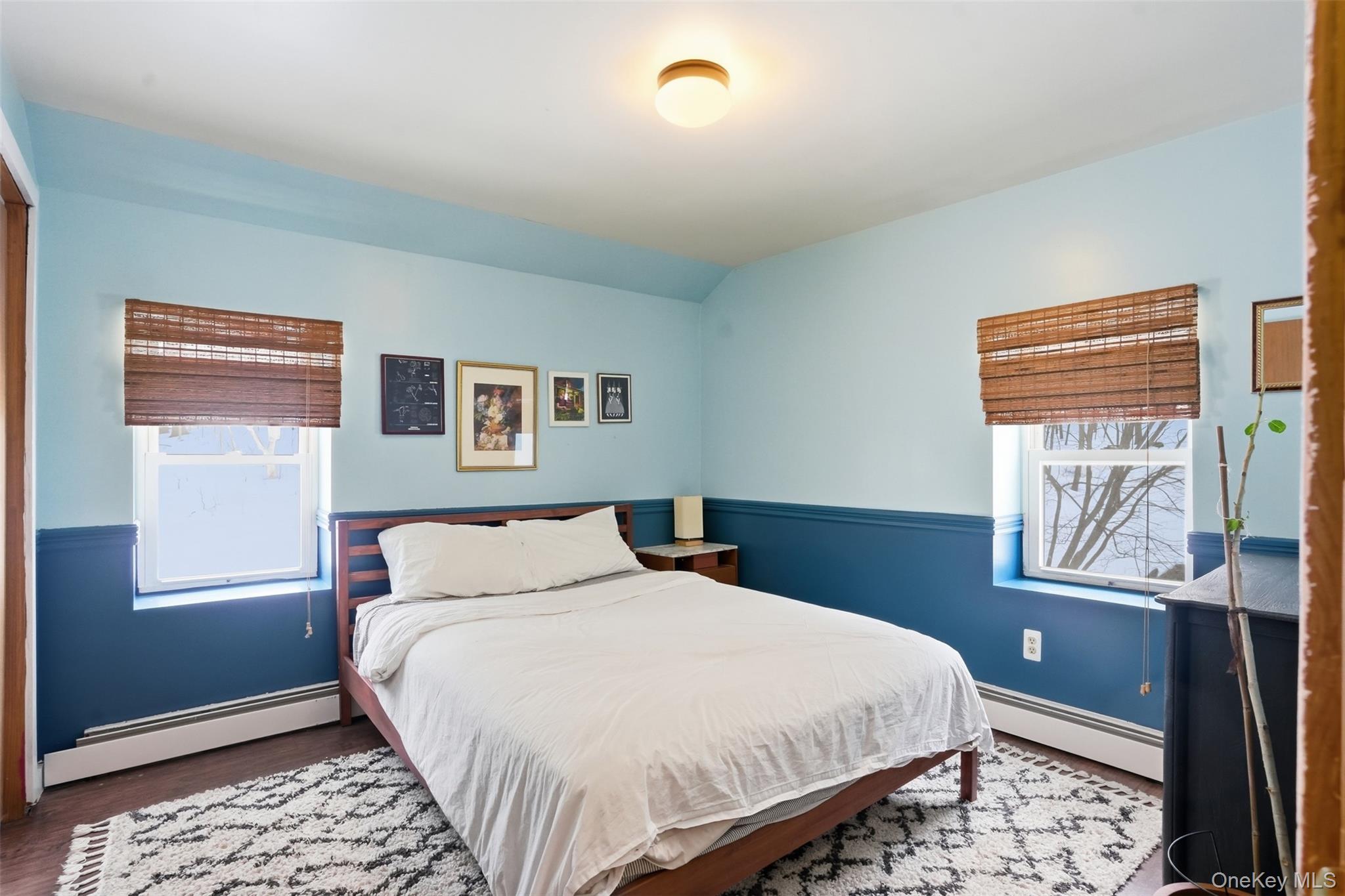 44 Triangle Of Clearwater Road Highland, NY 12528 - Photo 19 of 48 a bedroom with a bed and wooden floor