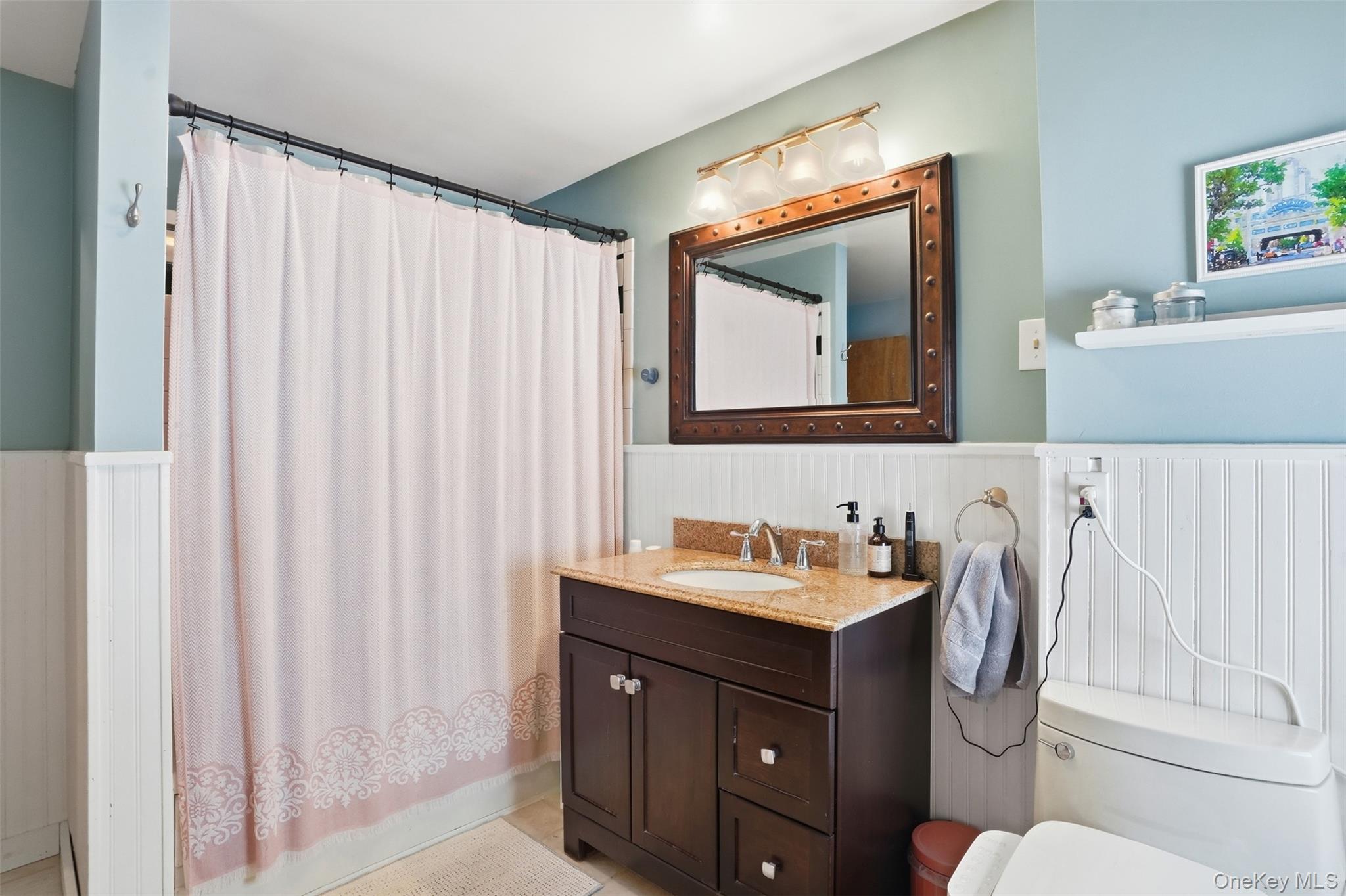 44 Triangle Of Clearwater Road Highland, NY 12528 - Photo 20 of 48 a bathroom with a toilet a sink and a mirror