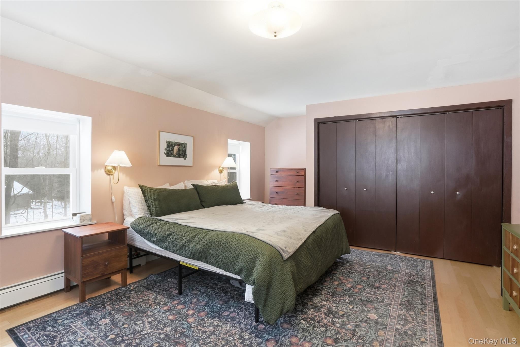 44 Triangle Of Clearwater Road Highland, NY 12528 - Photo 22 of 48 a bedroom with a bed and a large window