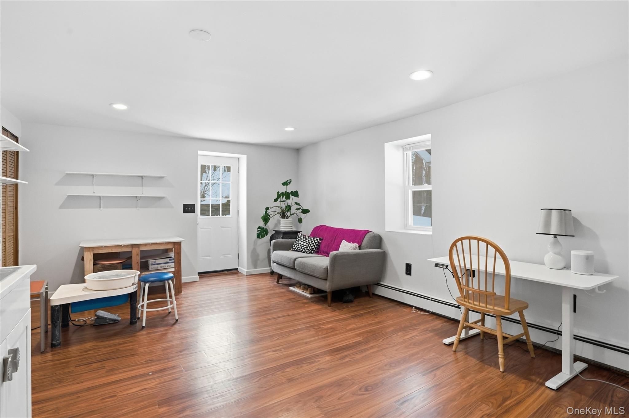44 Triangle Of Clearwater Road Highland, NY 12528 - Photo 29 of 48 a livingroom with furniture and a workspace