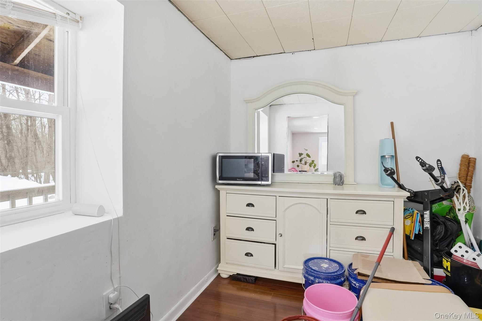 44 Triangle Of Clearwater Road Highland, NY 12528 - Photo 32 of 48 a bathroom with a sink mirror and vanity