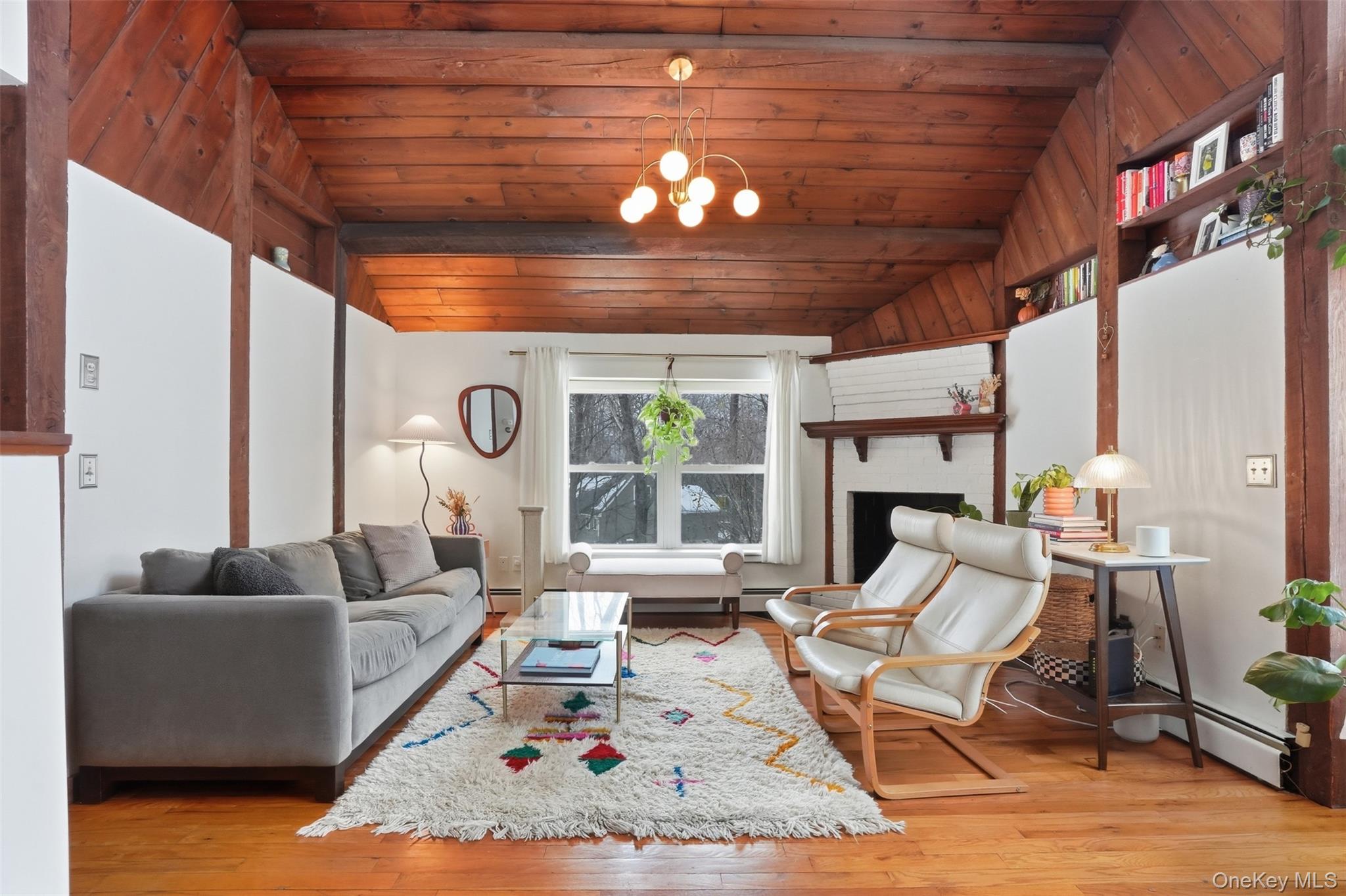 44 Triangle Of Clearwater Road Highland, NY 12528 - Photo 10 of 48 a living room with furniture and a large window