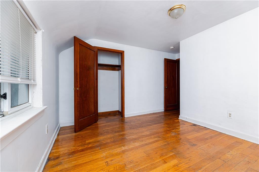 531 Beulah Road Pittsburgh, PA 15235 - Photo 18 of 32 a view of an empty room with closet and windows