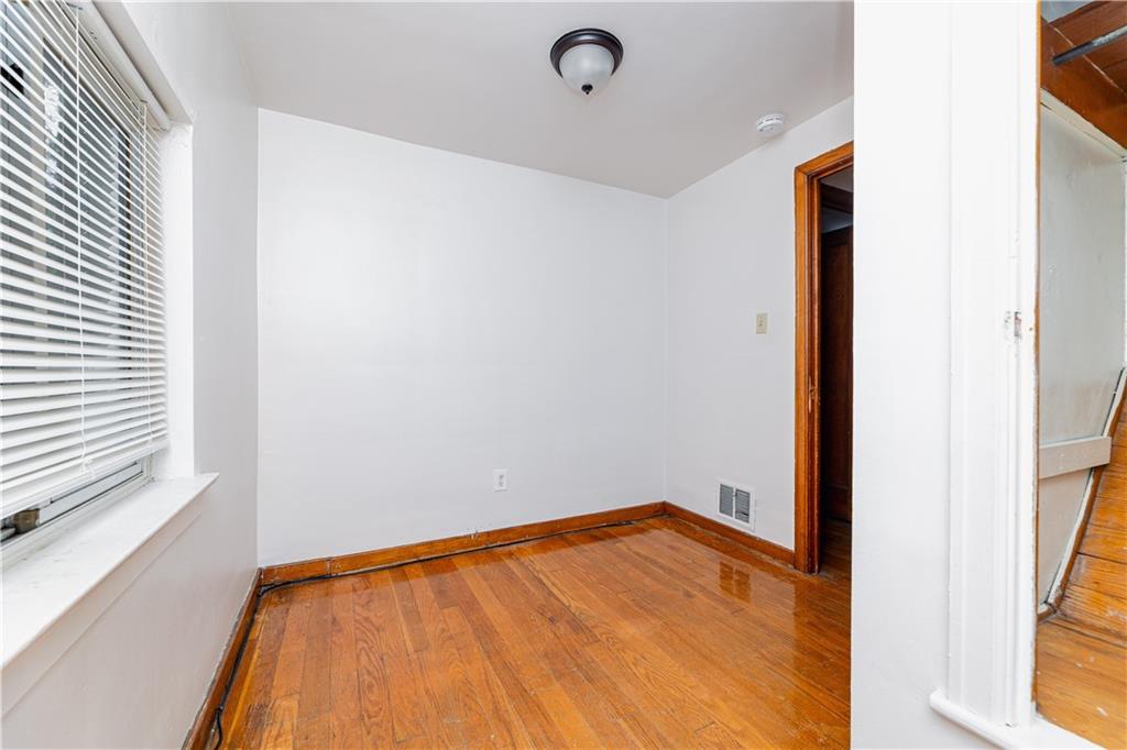 531 Beulah Road Pittsburgh, PA 15235 - Photo 22 of 32 a view of empty room with wooden floor