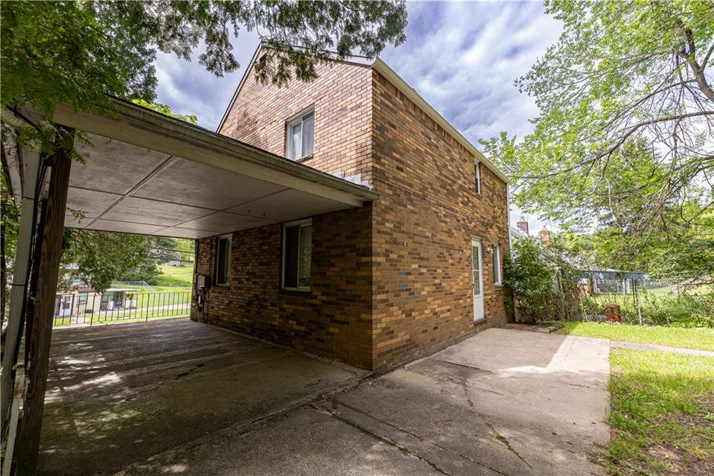 531 Beulah Road Pittsburgh, PA 15235 - Photo 28 of 32 a front view of a house with a yard