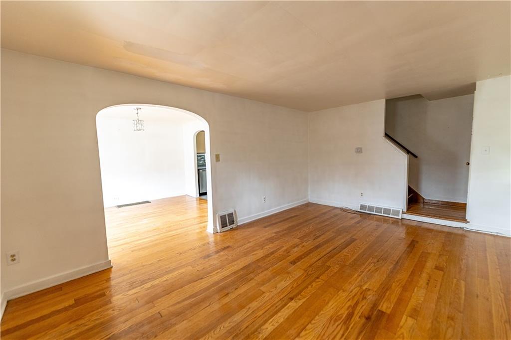 531 Beulah Road Pittsburgh, PA 15235 - Photo 4 of 32 a view of empty room with wooden floor