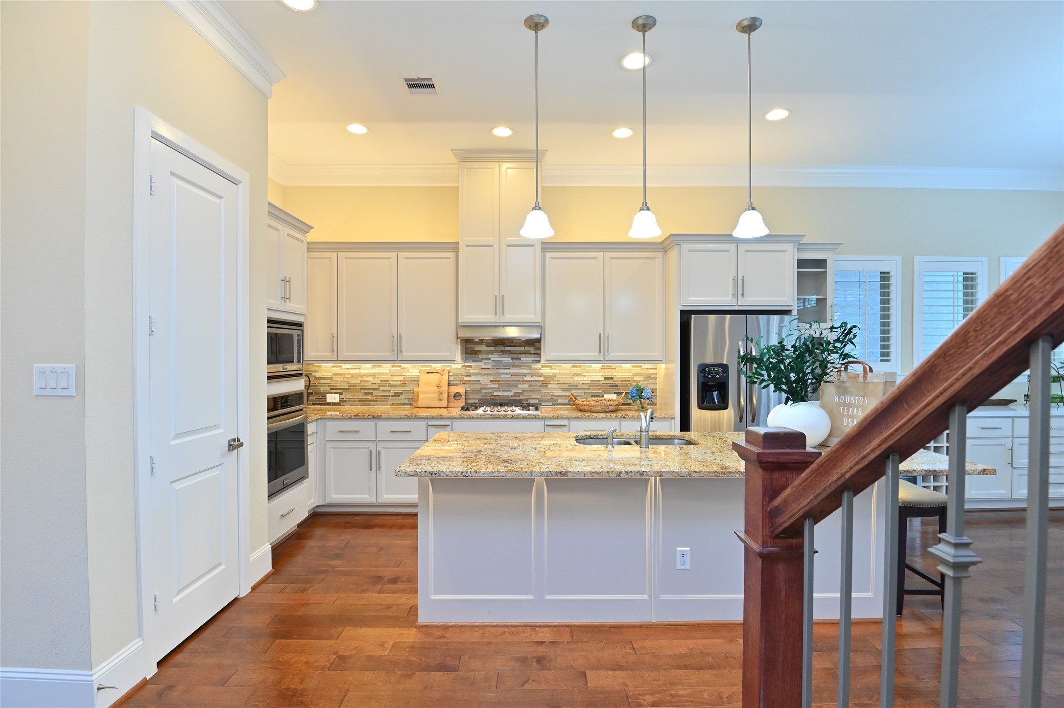 11906 McNabb Lane Houston, TX 77082 - Photo 13 of 45 a kitchen with kitchen island a sink stainless steel appliances and cabinets