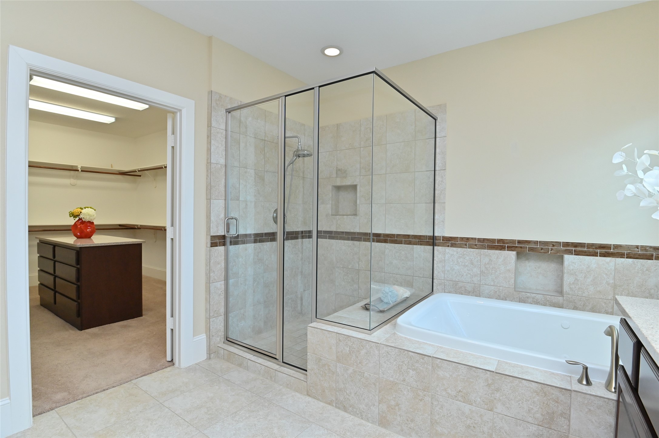 11906 McNabb Lane Houston, TX 77082 - Photo 23 of 45 a bathroom with a tub and a shower