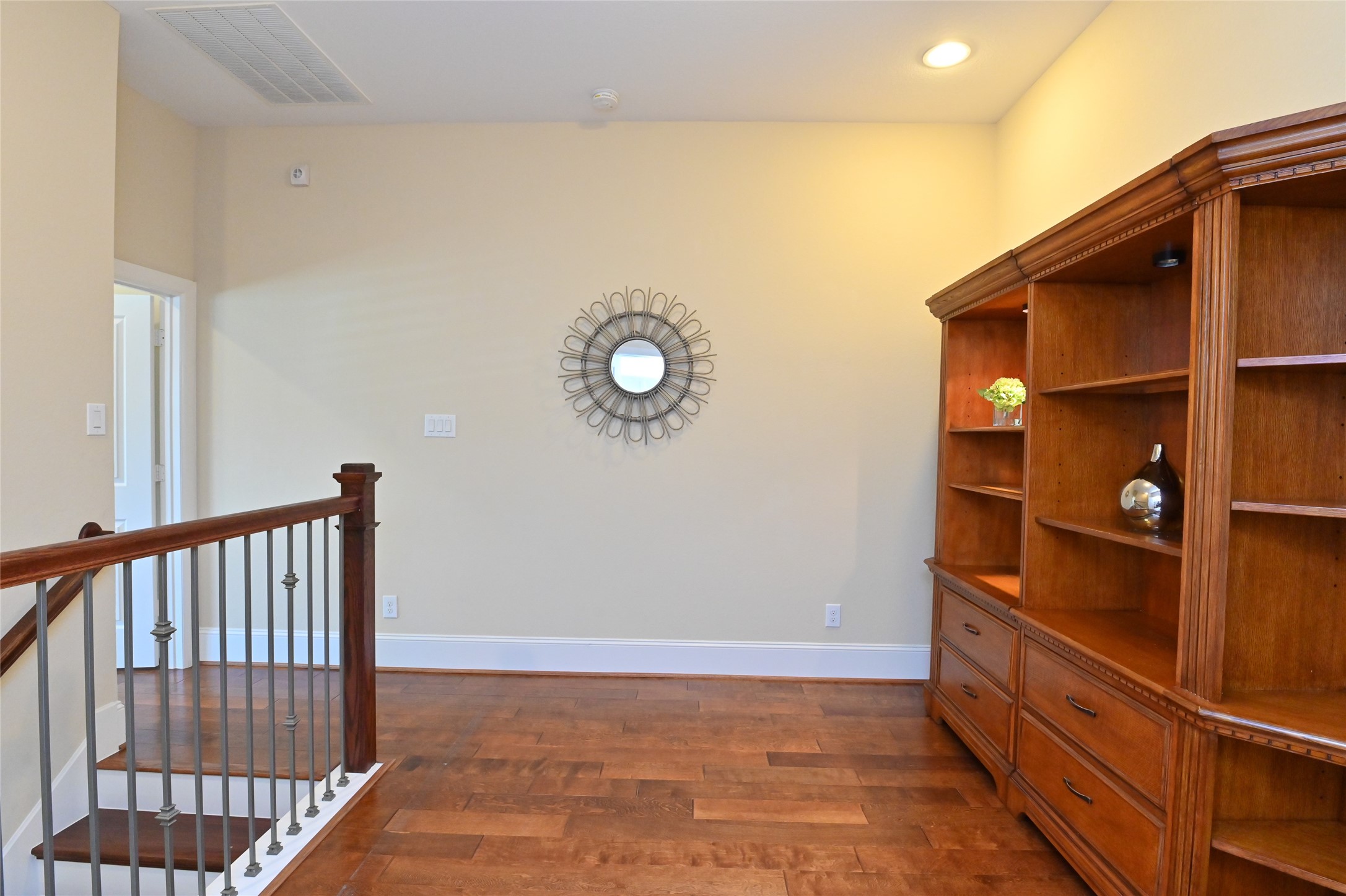 11906 McNabb Lane Houston, TX 77082 - Photo 28 of 45 a view of a hallway with wooden floor