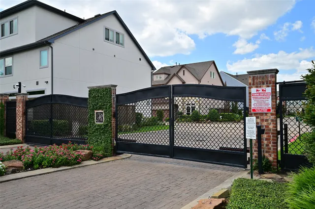 a front view of a house having garden