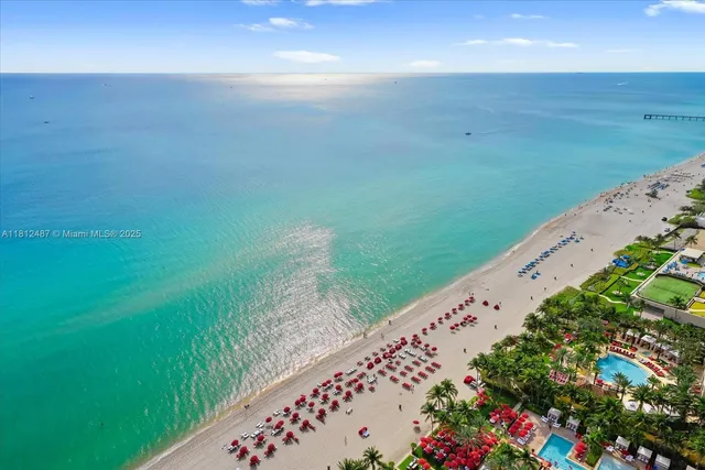 a utility room with sink dryer and washer