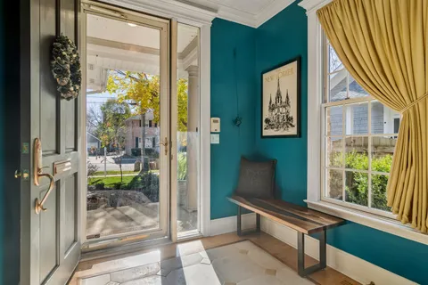 a outdoor space with sliding door and wooden floor