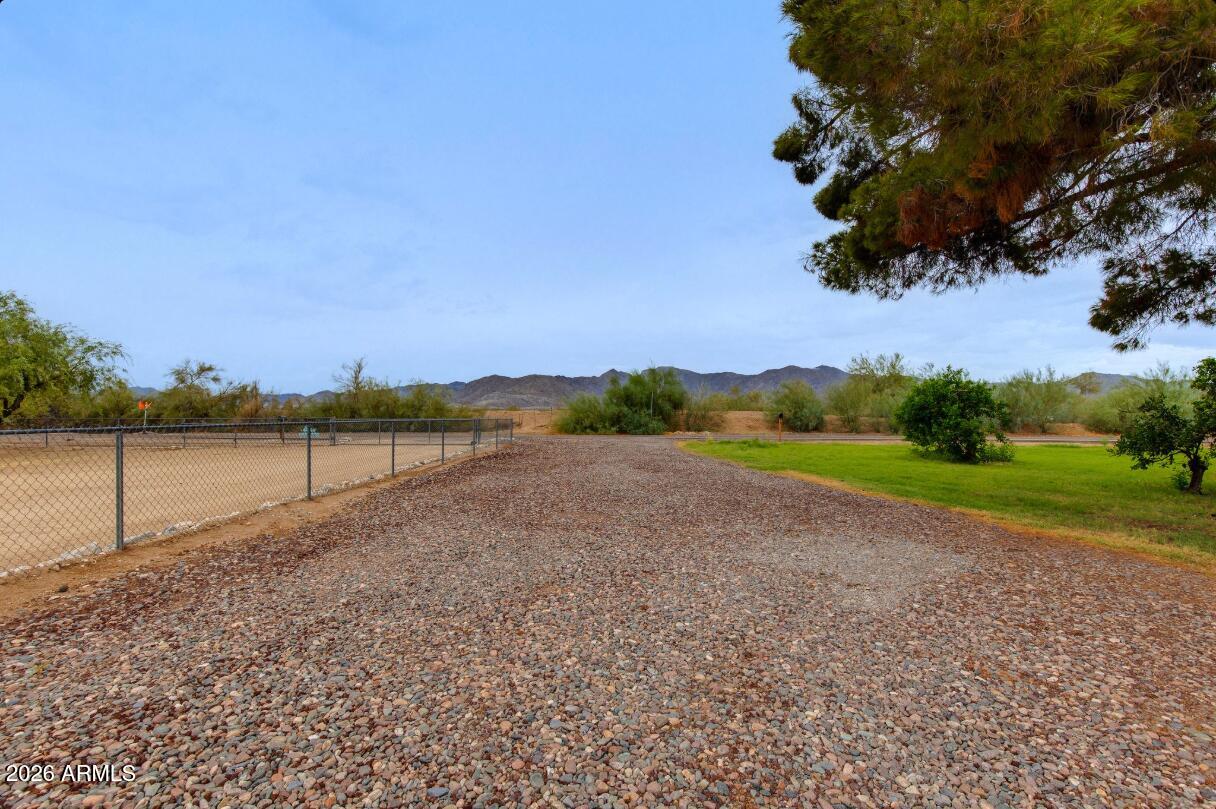 7101 North Perryville Road Waddell, AZ 85355 - Photo 63 of 66 7101 N Perryville driveway 2