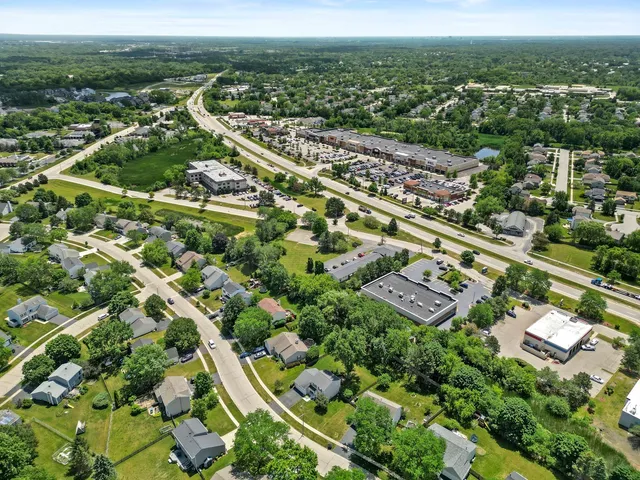 an aerial view of a house with a garden