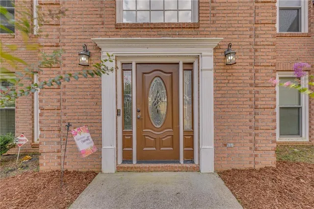 a front view of a house with entrance