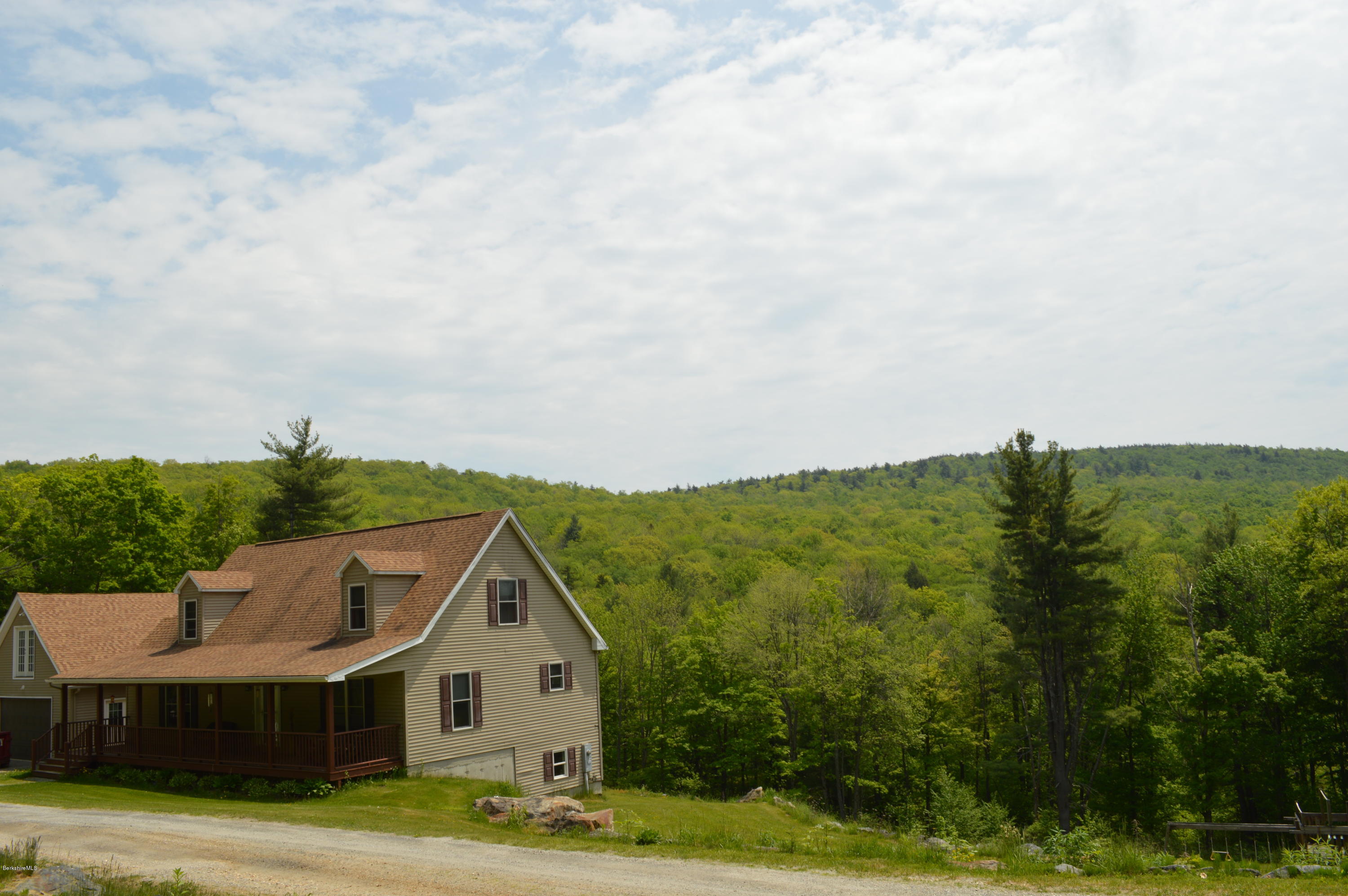 41 South Road Ext Road Peru, MA 01235 - Photo 3 of 55 a view of a big house with a big yard and large trees