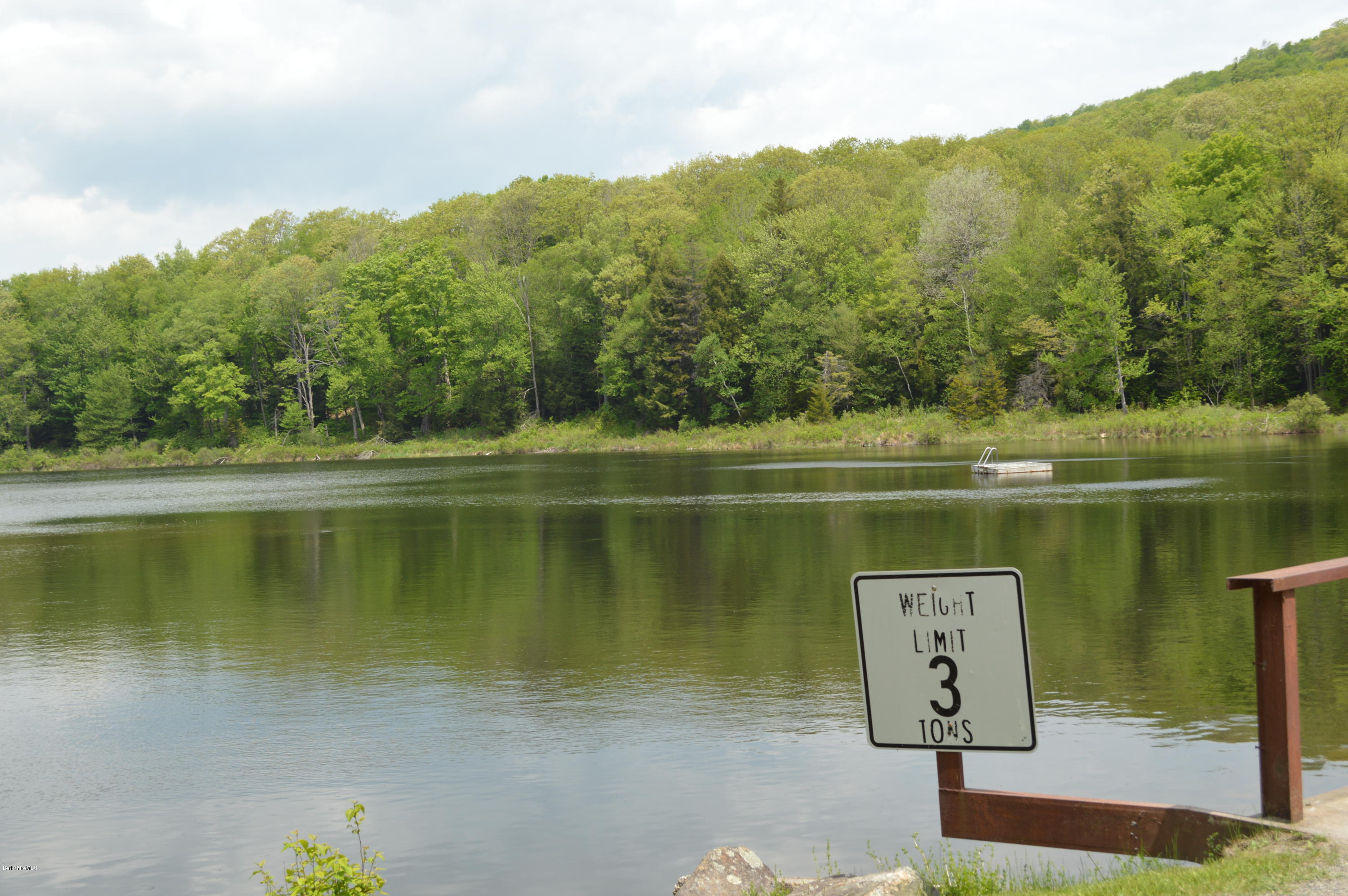 41 South Road Ext Road Peru, MA 01235 - Photo 8 of 55 a view of a lake with a mountain