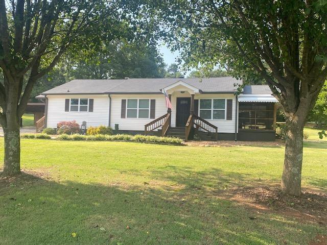 82 Stephens Road Cedartown, GA 30125 - Photo 1 of 1 a front view of a house with swimming pool
