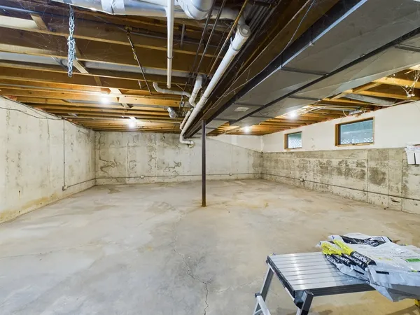 an aerial view of a house with a yard and garden