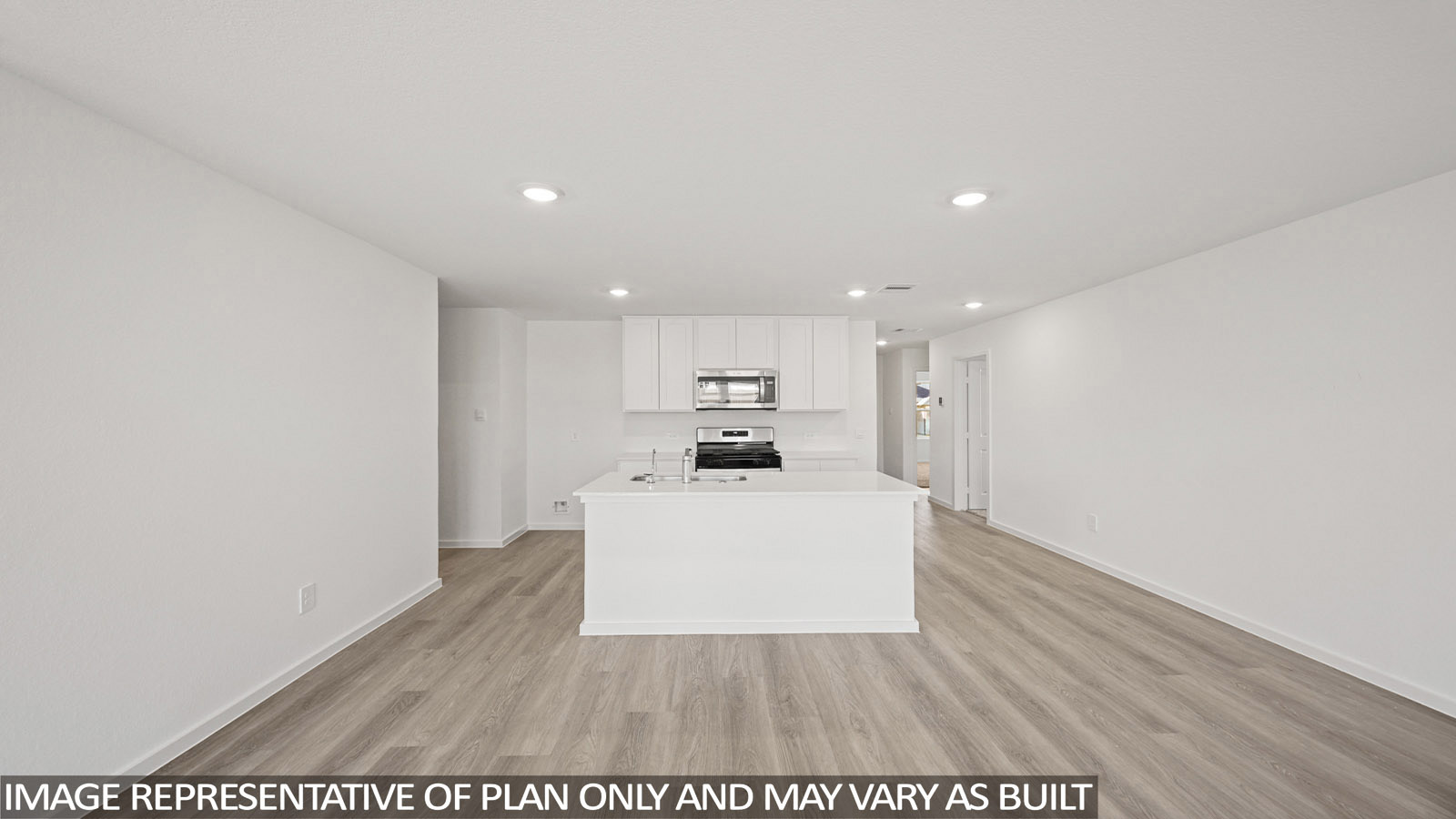 152 Baby Calf Roping Road Jarrell, TX 76537 - Photo 7 of 23 Open-concept living space featuring wood-finish flooring, recessed lighting, a kitchen island with seating, white cabinetry, and stainless steel appliances
