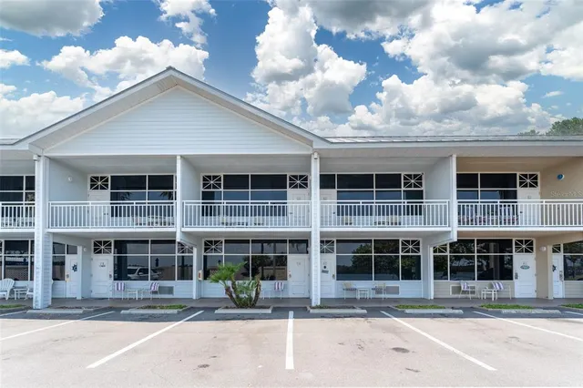 a front view of building with street