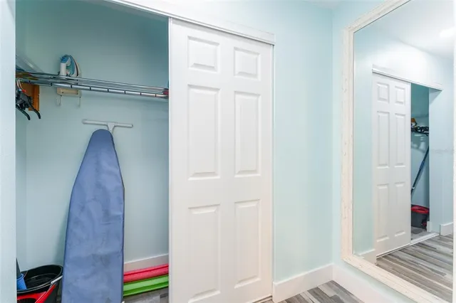 a view of a swimming pool with a lounge chair