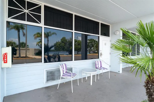 an aerial view of a house with a garden lake view
