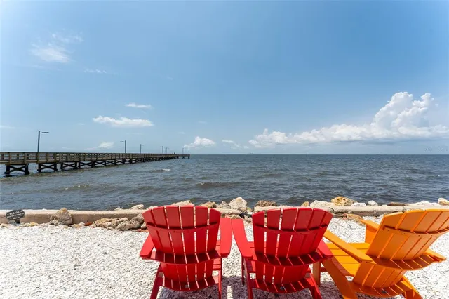 a view of a car park in front of a house