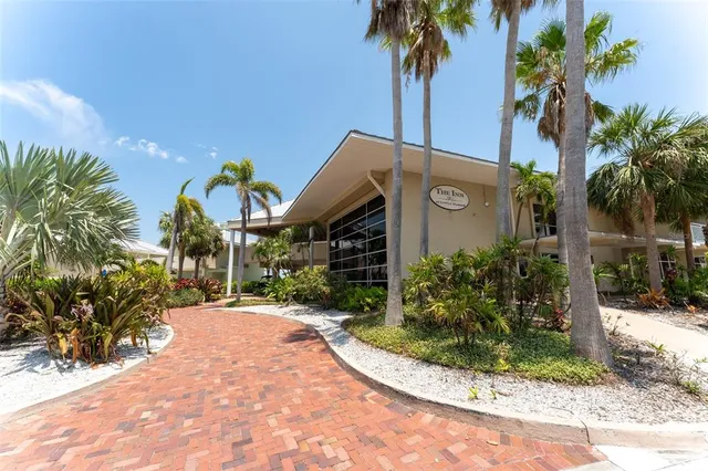 an aerial view of a house with a swimming pool