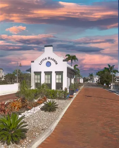 a bedroom with a bed and a table in it
