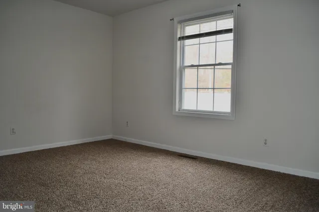 an empty room with an entryway