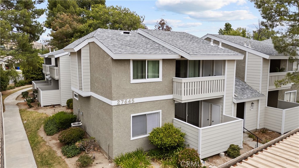 27645 Susan Beth Way, Unit A Saugus, CA 91350 - Photo 1 of 26 a view of a house with a yard and potted plants