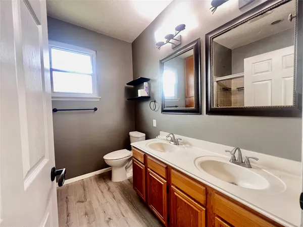 a bathroom with a glass door shower