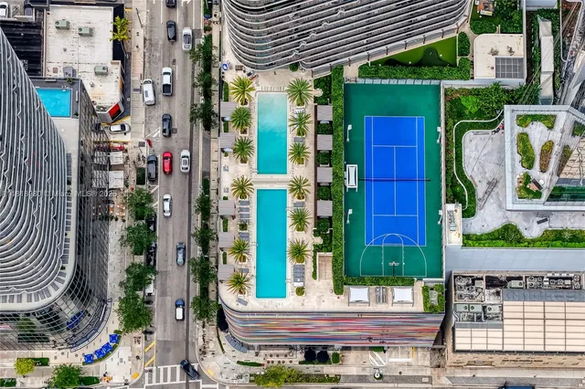 a view of a lake with a city skyline in the background