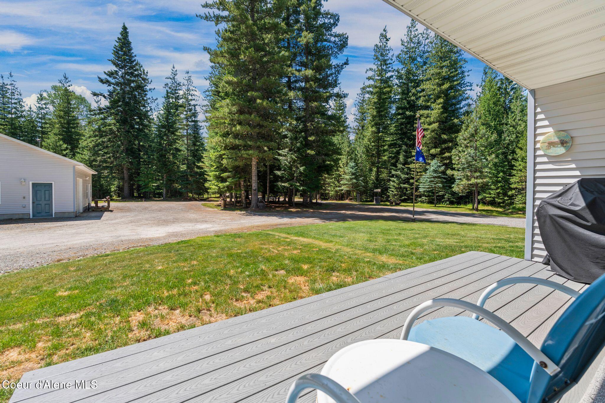 249 Indigo Sky Road Sandpoint, ID 83864 - Photo 36 of 66 Covered front deck